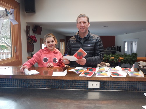 2016 BC Xmas Greg & Madi prepare Xmas cards