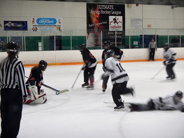 2017 Madi moves in on goal in a Ringette game