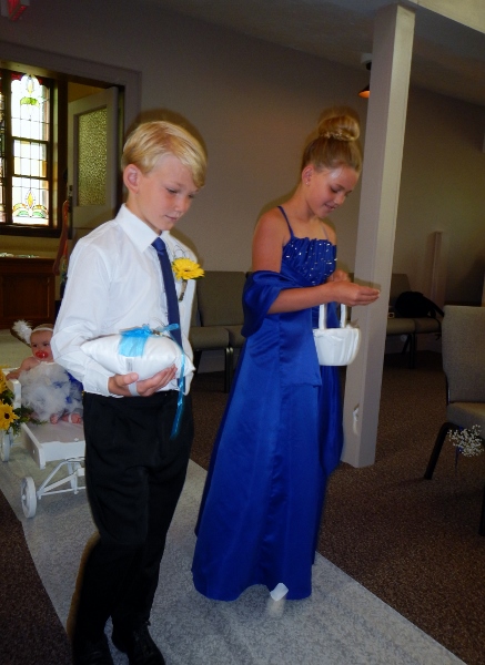 2015
            Madi & Barrett walk together down the isle at wedding