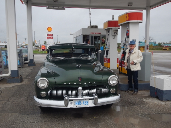 2018 Car Club Car Tour Walpole Eleanor with the 69 Merc
        while refueling
