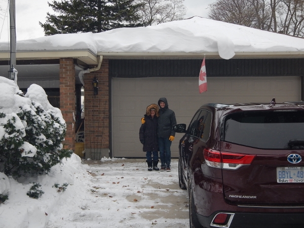 2019 Rod & Titania pose in front of the garage
            winter scene