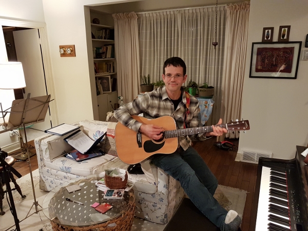 2019 Rod strums the guitar