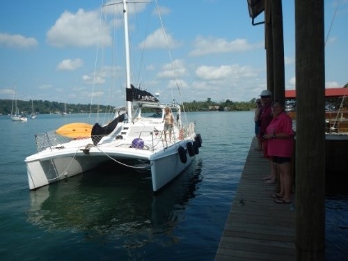 Our friends on Iguana Dance leave the
          dock at Ram heading to Belize