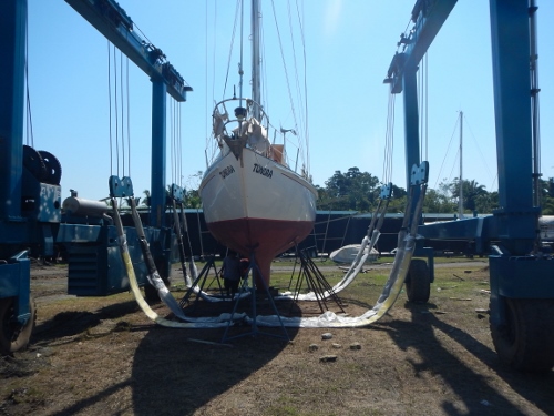 The slings are placed under Tundra just before being
        lifted