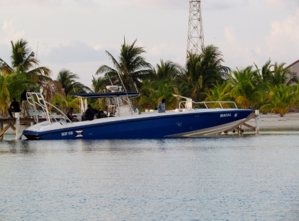 Belizian Coast Guard drug police boat
            ties up beside us fo the night at SW Cay