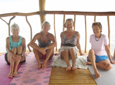 Onshore at
              North Long Cocoa the girls pose with their Yoga Mats