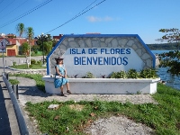 Kathy at the entrance to Flores Guatemala located near
            Tikal