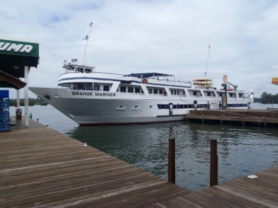 A shallow draft
                cruise ship specially designed for river travel takes on
                fuel